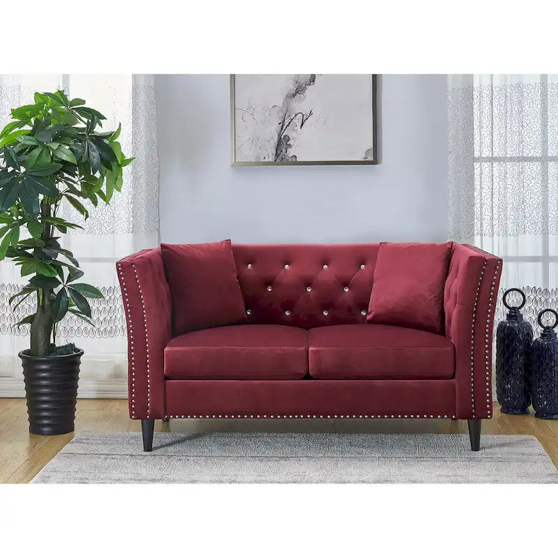 Causeuse en velours capitonné avec pieds en bois et coussins décoratifs