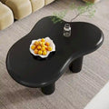 Table basse de 100,0 cm en bois manufacturé en forme de nuage avec 4 pieds en PVC