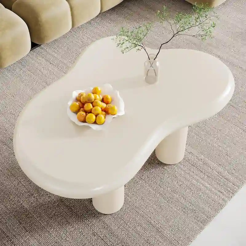 Table basse de 100,0 cm en bois manufacturé en forme de nuage avec 4 pieds en PVC