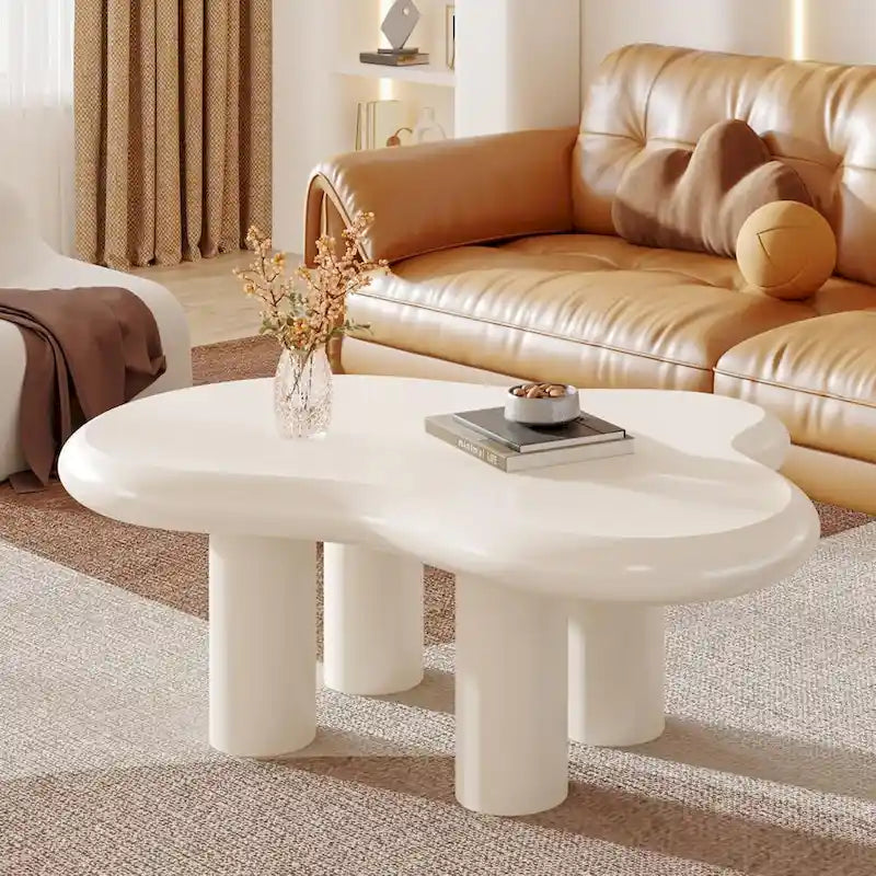 Table basse de 100,0 cm en bois manufacturé en forme de nuage avec 4 pieds en PVC